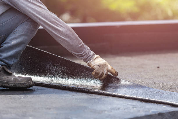 Professional Exterior Waterproofing technician working in Russellville, IN